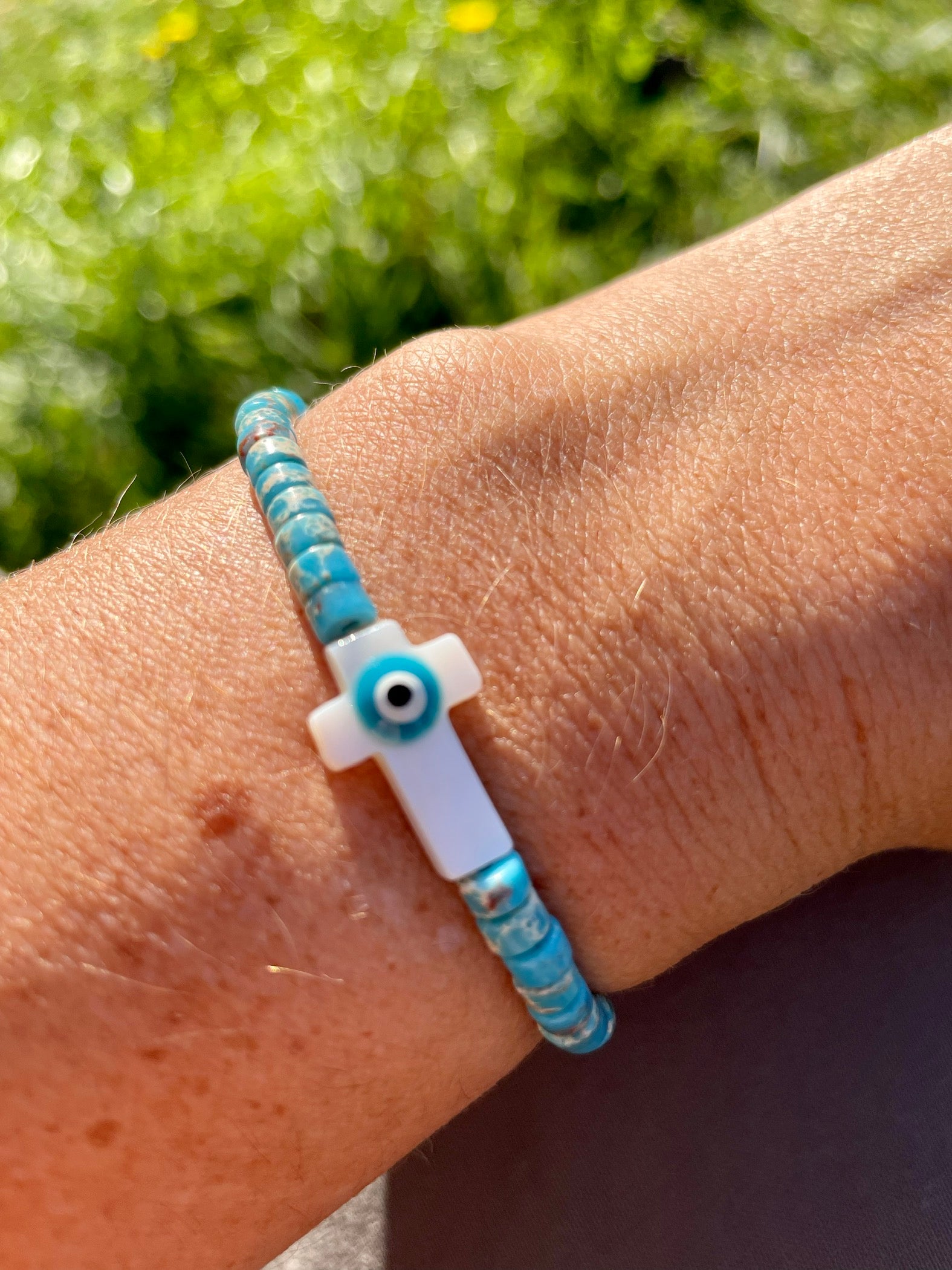 Fira_heishi-croix-oeil