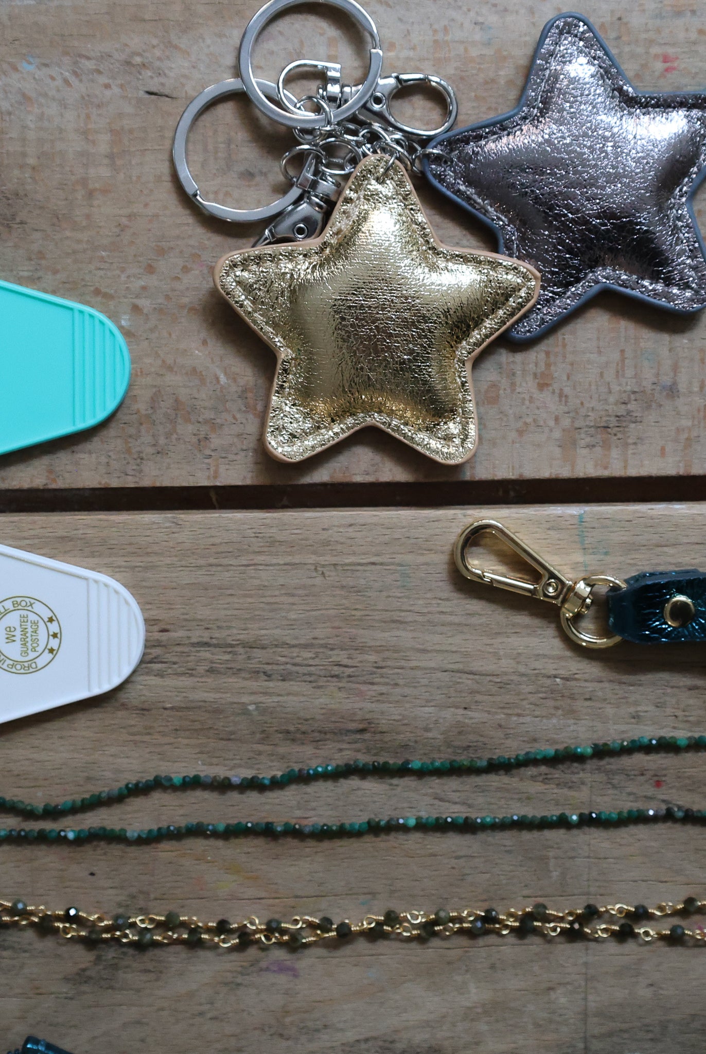 Porte clef etoile or et argent